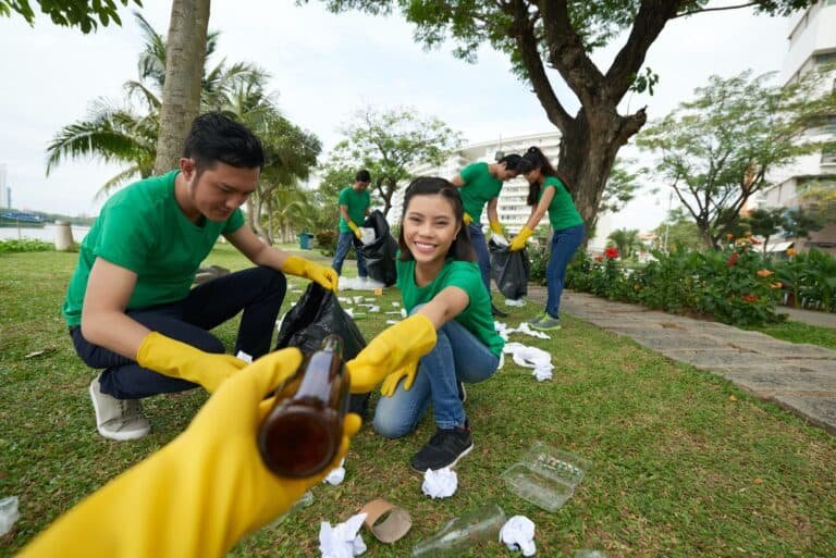 Environmental activist picking up rubbish