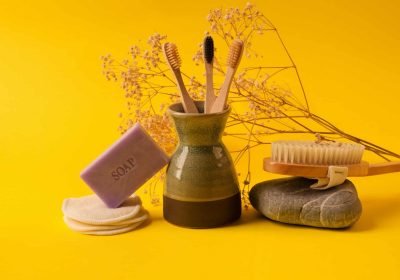 Zero waste beauty routine products on yellow